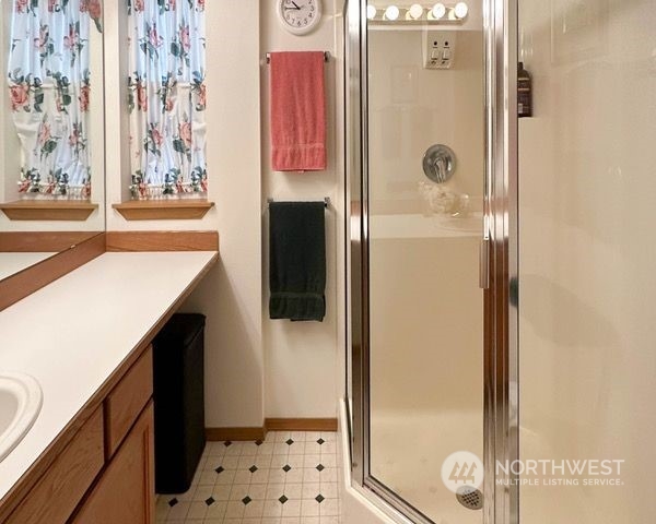 225 99th Place Southwest Everett, WA 98204 - Photo 12 of 30 a bathroom with a shower and a sink