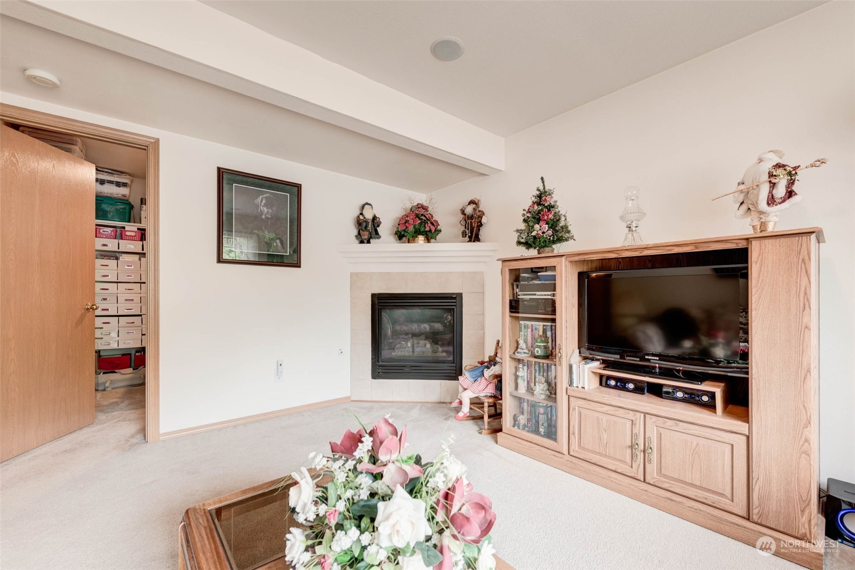 225 99th Place Southwest Everett, WA 98204 - Photo 18 of 30 a living room with furniture and a flat screen tv