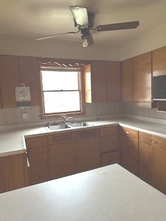 460 West Gridley Street Bushnell, IL 61422 - Photo 4 of 30 a kitchen with granite countertop a stove and a sink