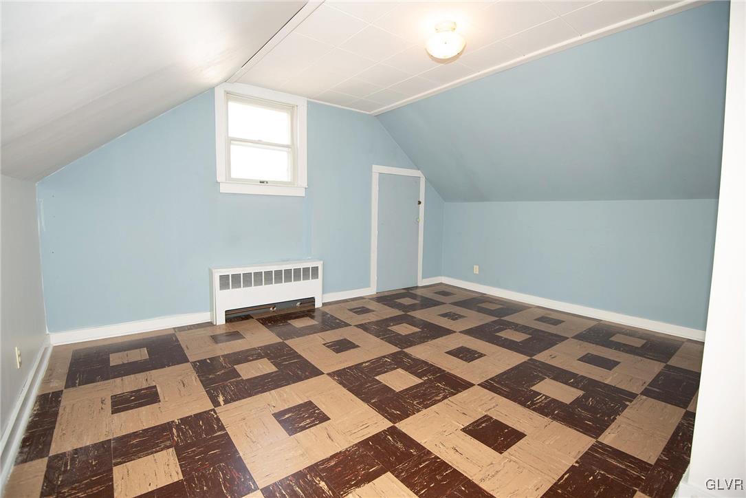 3003 Cornwall Road Bethlehem, PA 18017 - Photo 16 of 27 a bedroom with a bed and a rug