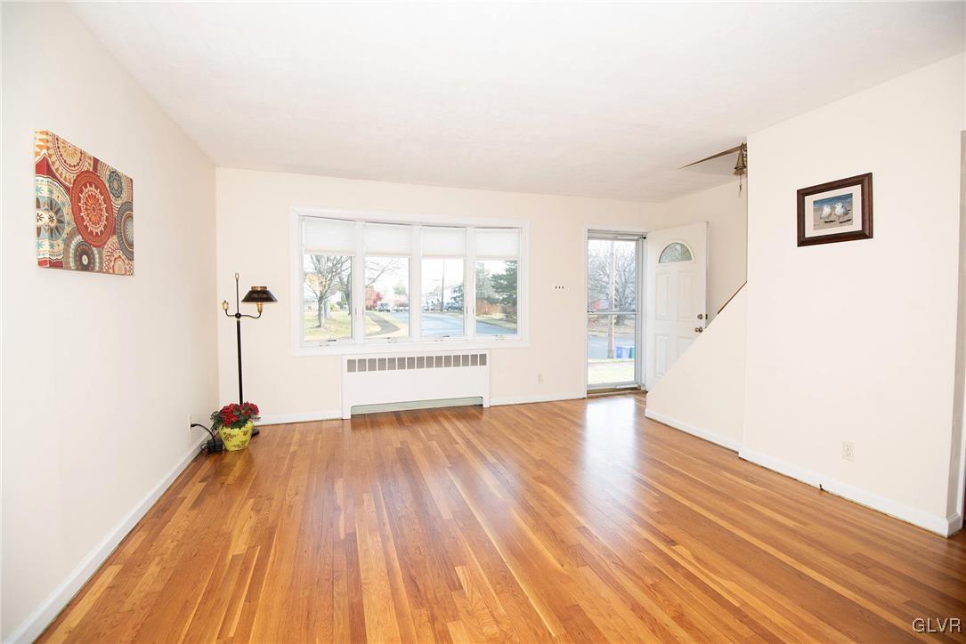 3003 Cornwall Road Bethlehem, PA 18017 - Photo 3 of 27 a view of empty room with wooden floor and fan