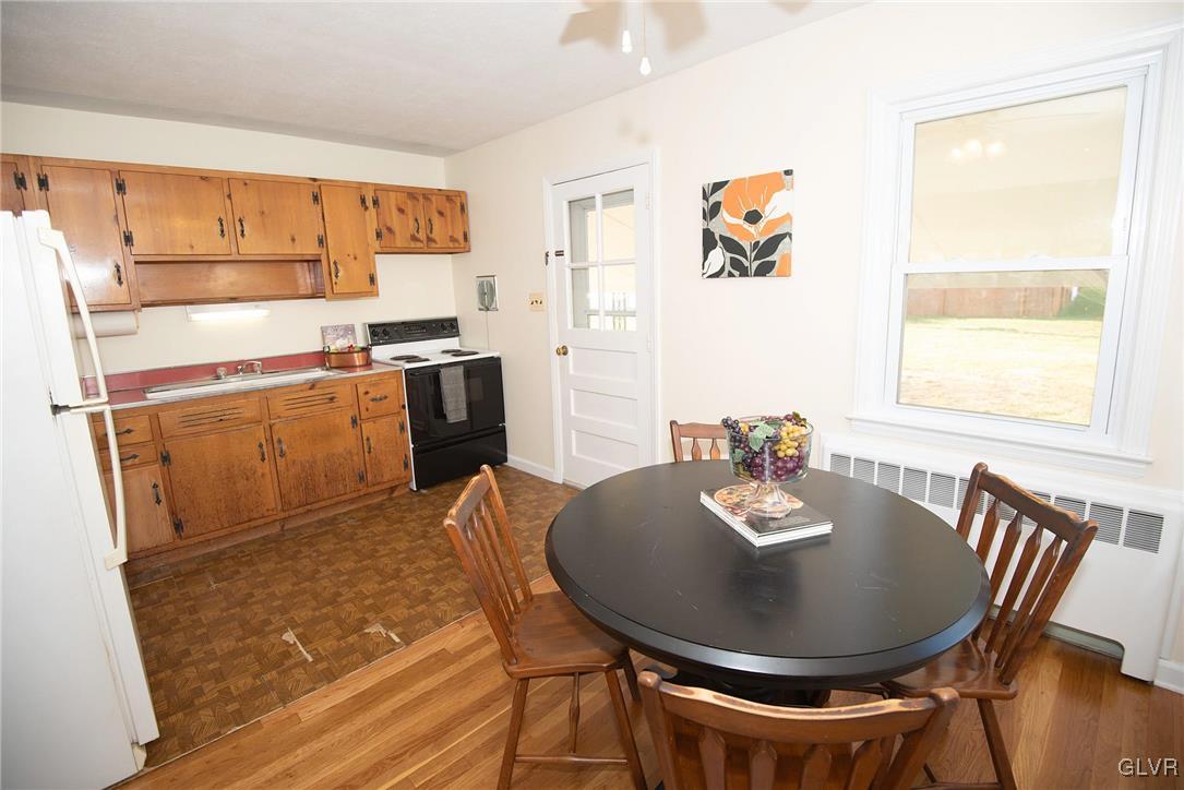3003 Cornwall Road Bethlehem, PA 18017 - Photo 6 of 27 a view of a dining room with furniture window and wooden floor