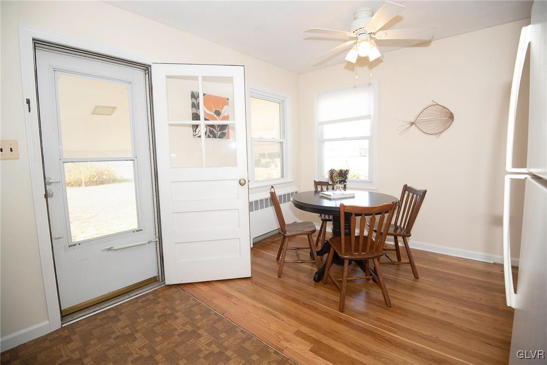 3003 Cornwall Road Bethlehem, PA 18017 - Photo 8 of 27 a dining room with furniture a window and wooden floor