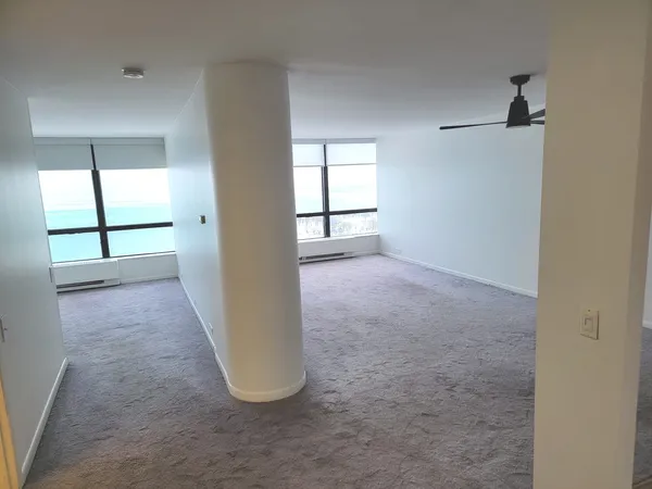 an empty room with windows