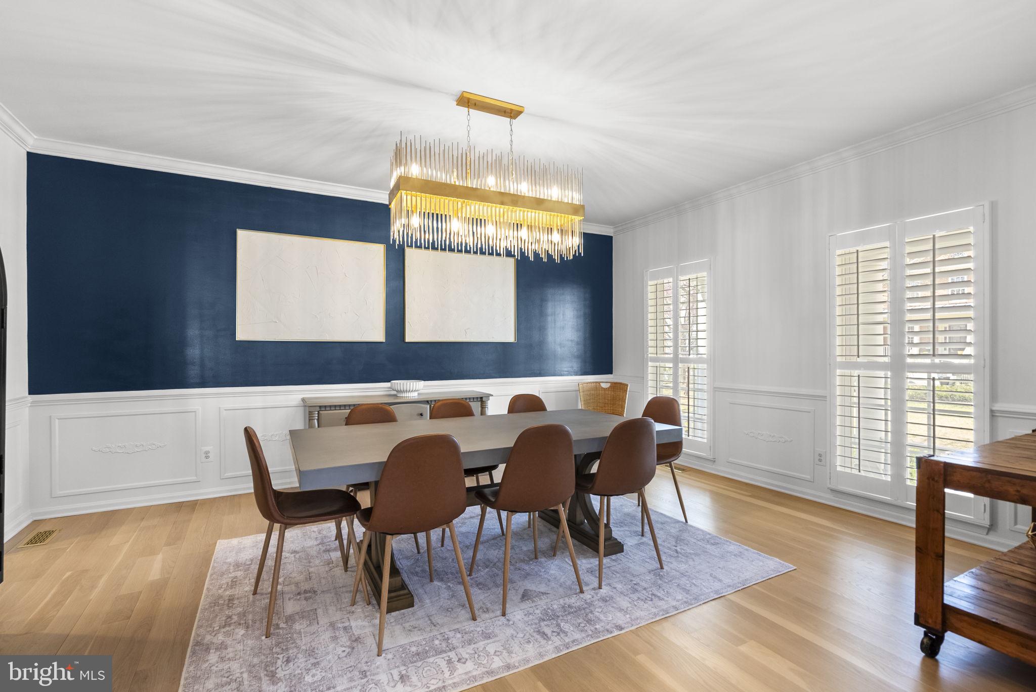 1339 Main Street Gaithersburg, MD 20878 - Photo 15 of 73 a view of a dining room with furniture and wooden floor