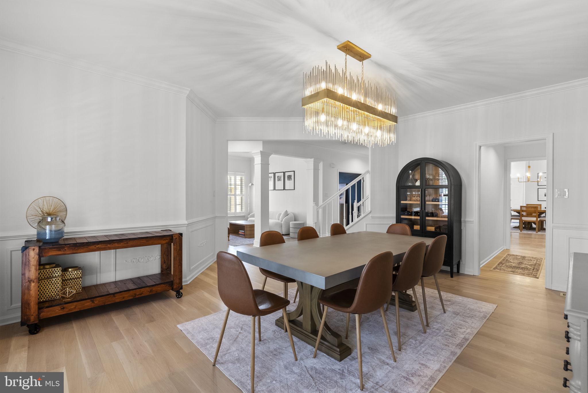 1339 Main Street Gaithersburg, MD 20878 - Photo 17 of 73 a view of a dining room with furniture and wooden floor