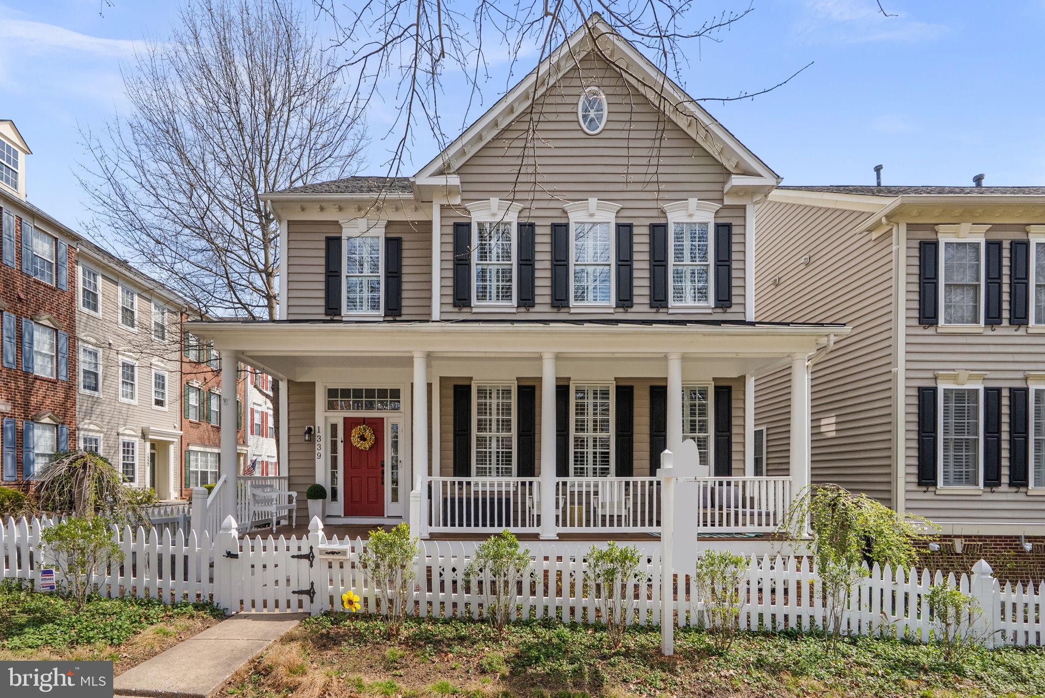 1339 Main Street Gaithersburg, MD 20878 - Photo 2 of 73 front view of a house with a small yard
