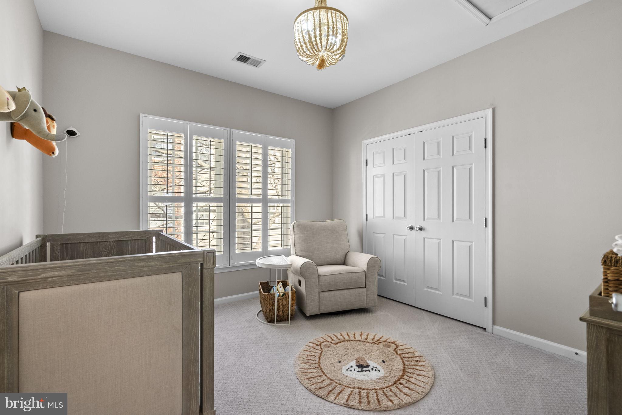 1339 Main Street Gaithersburg, MD 20878 - Photo 38 of 73 a living room with furniture and a window