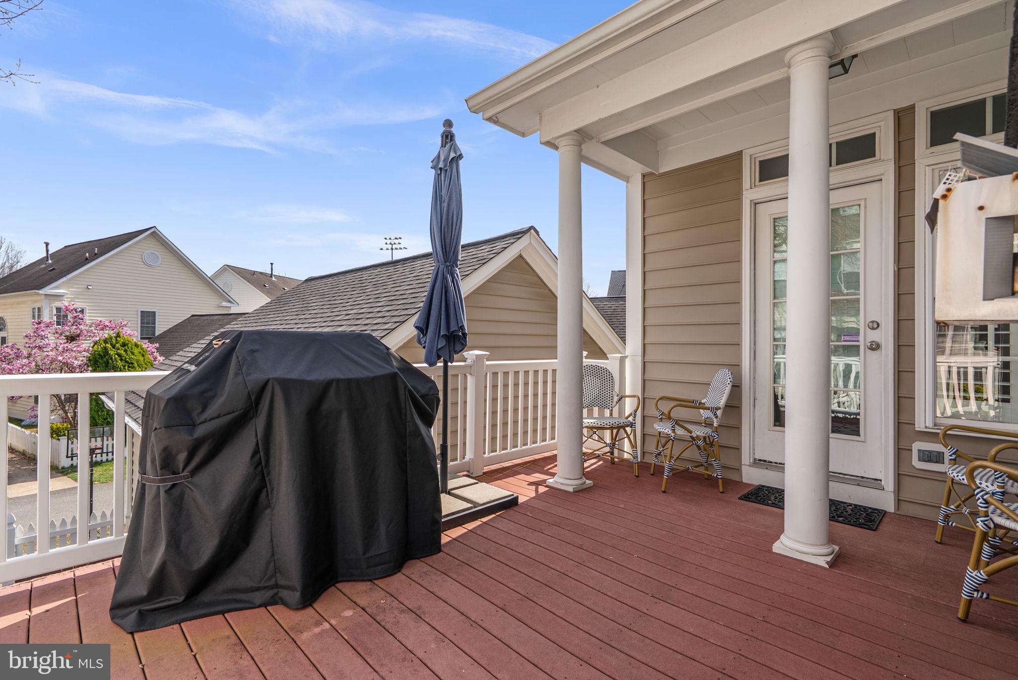1339 Main Street Gaithersburg, MD 20878 - Photo 51 of 73 a view of house with deck outdoor seating and wooden floor