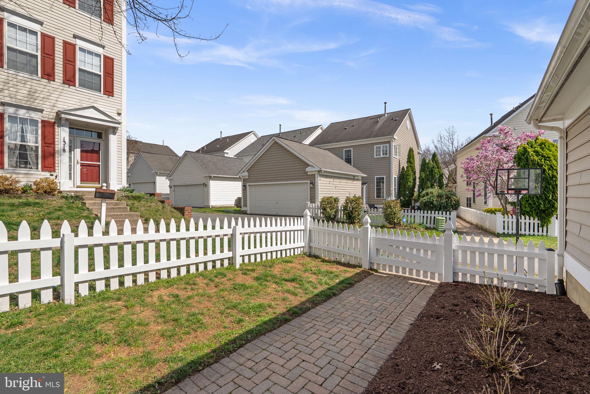 1339 Main Street Gaithersburg, MD 20878 - Photo 55 of 73 a view of a house with wooden fence