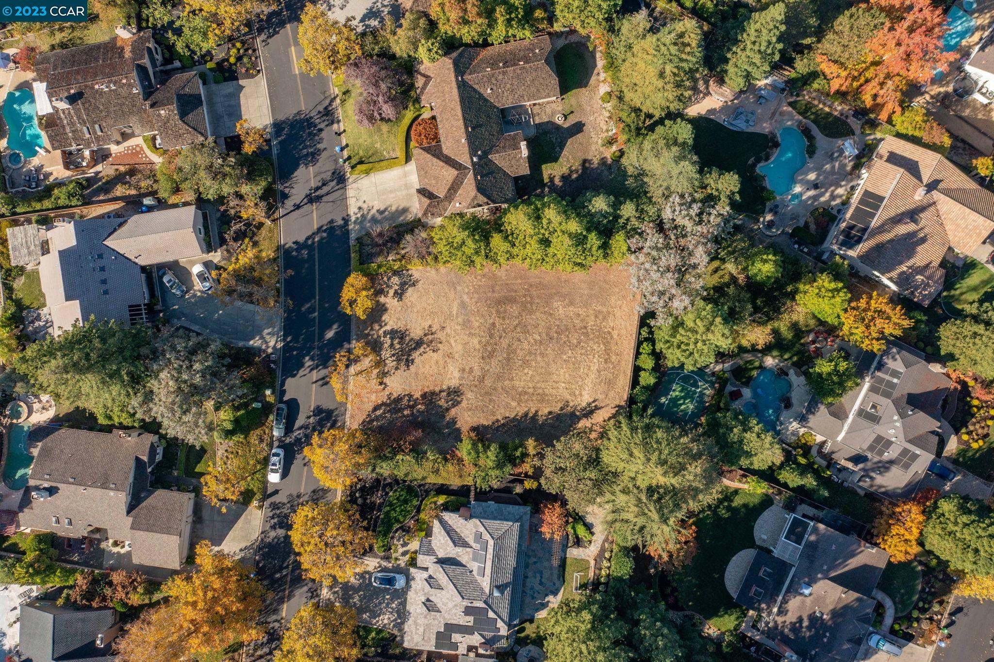 an aerial view of residential house with outdoor space