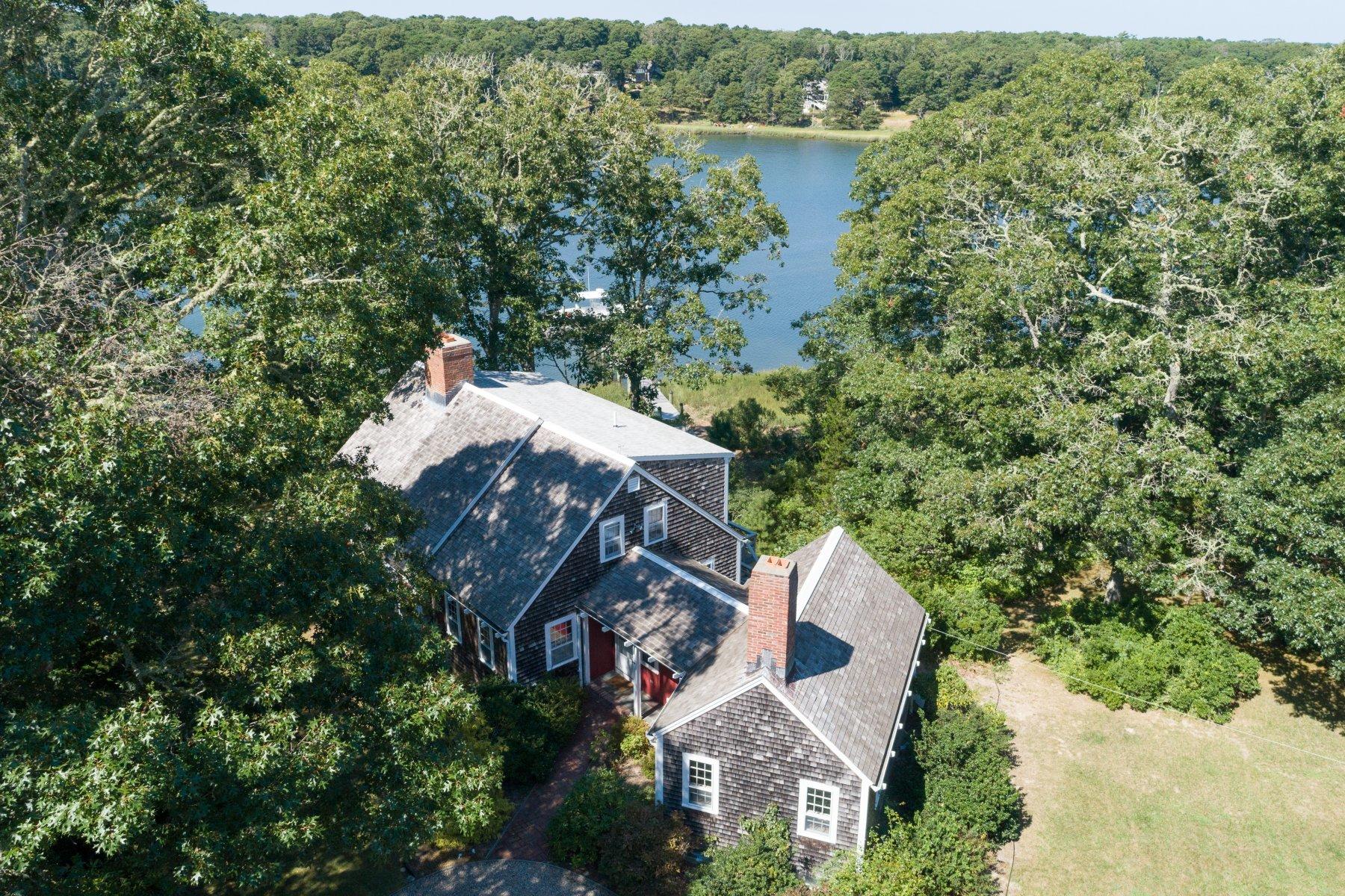 40 Viking Road Orleans, MA 02653 - Photo 17 of 27 an aerial view of a house with a yard and a large tree
