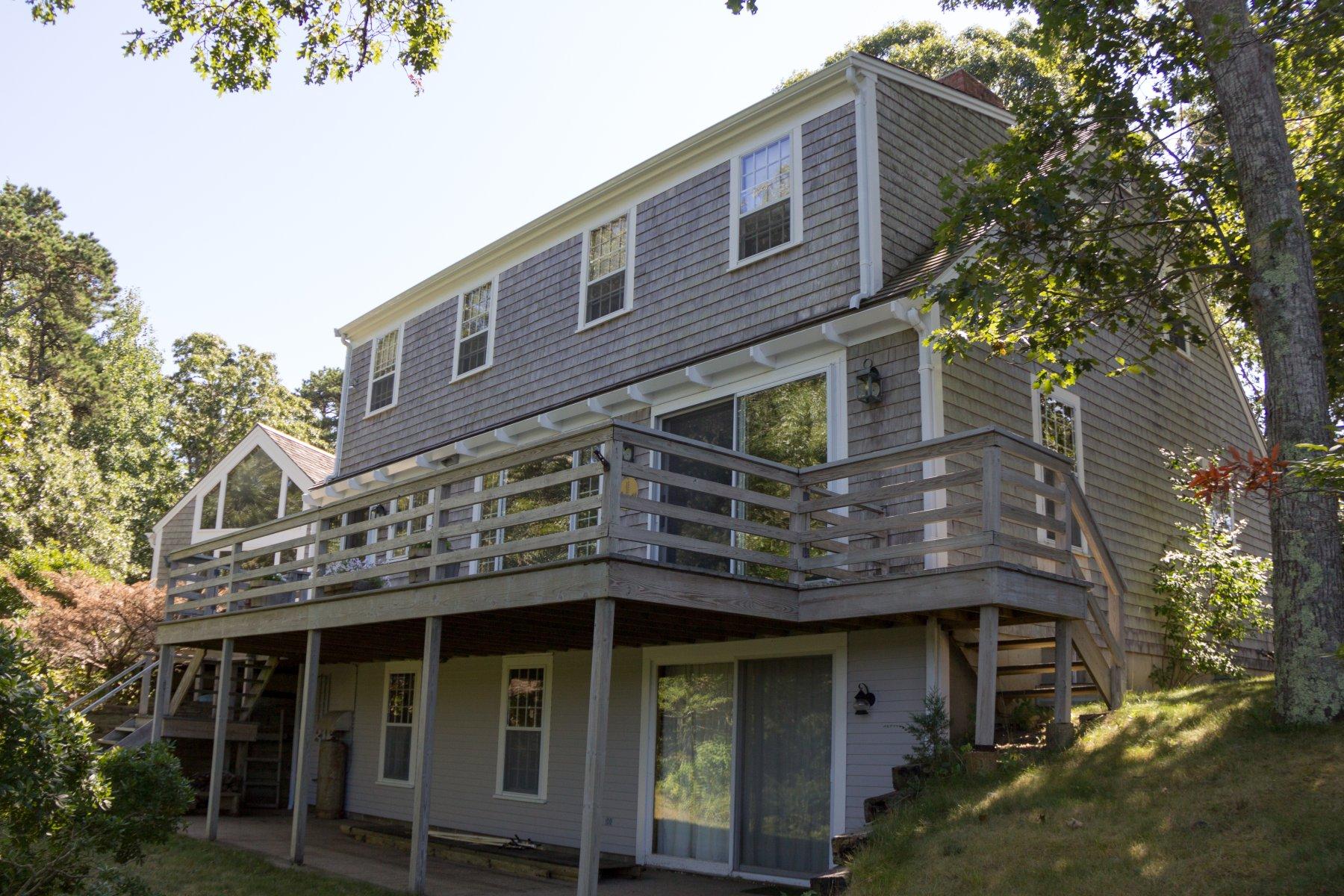 40 Viking Road Orleans, MA 02653 - Photo 18 of 27 a view of a house with a window and wooden fence