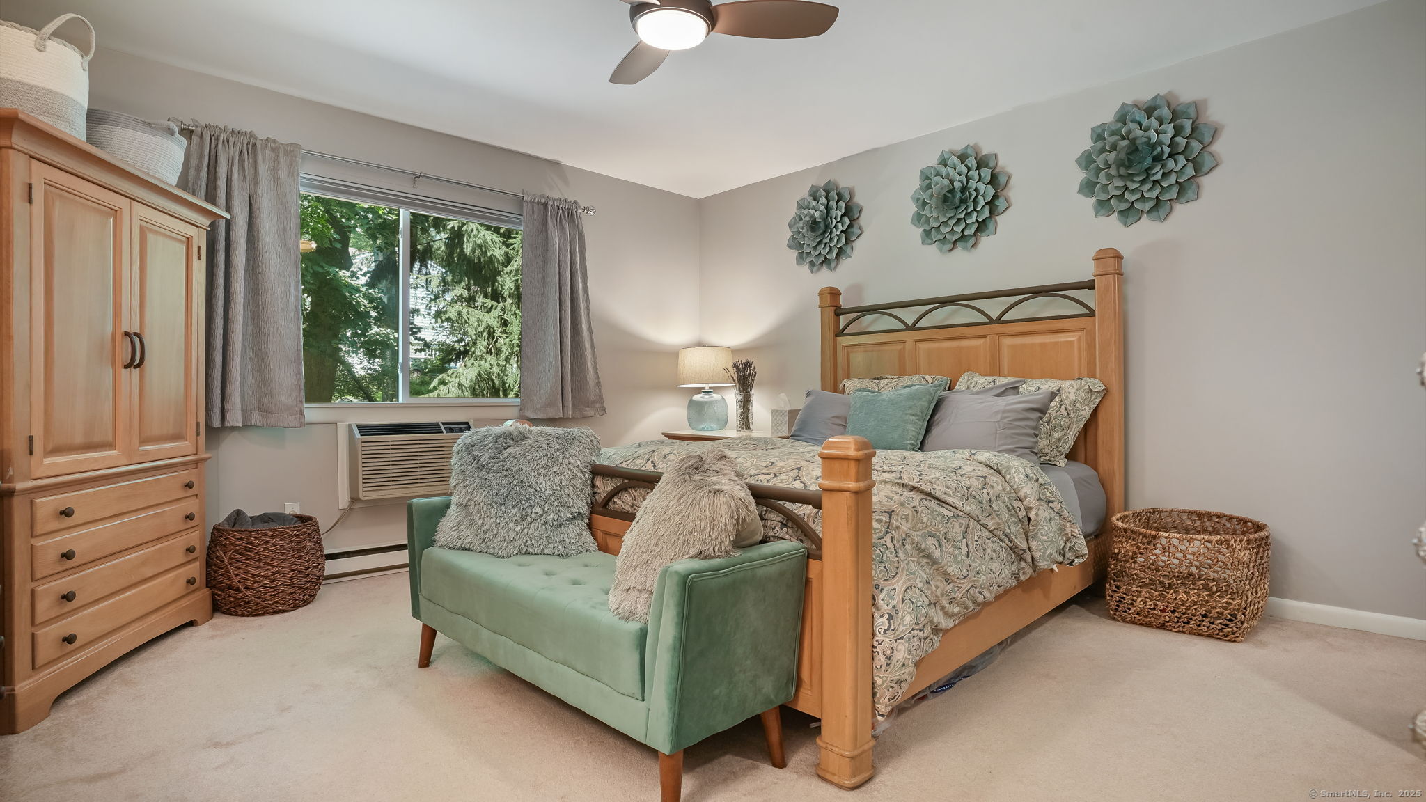 97 Richards Avenue, Unit B10 Norwalk, CT 06854 - Photo 16 of 35 a bedroom with bed and window