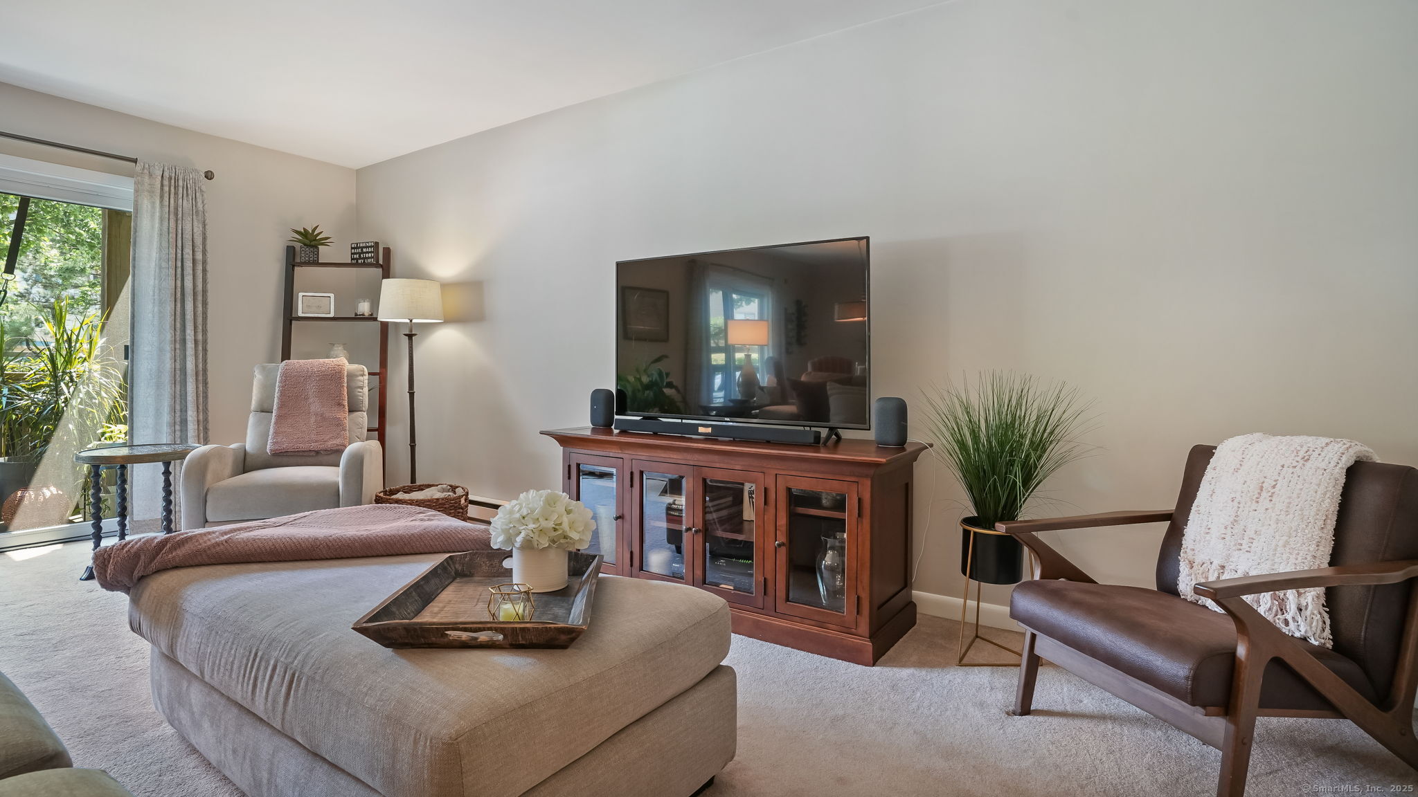 97 Richards Avenue, Unit B10 Norwalk, CT 06854 - Photo 5 of 35 a living room with furniture and a fireplace