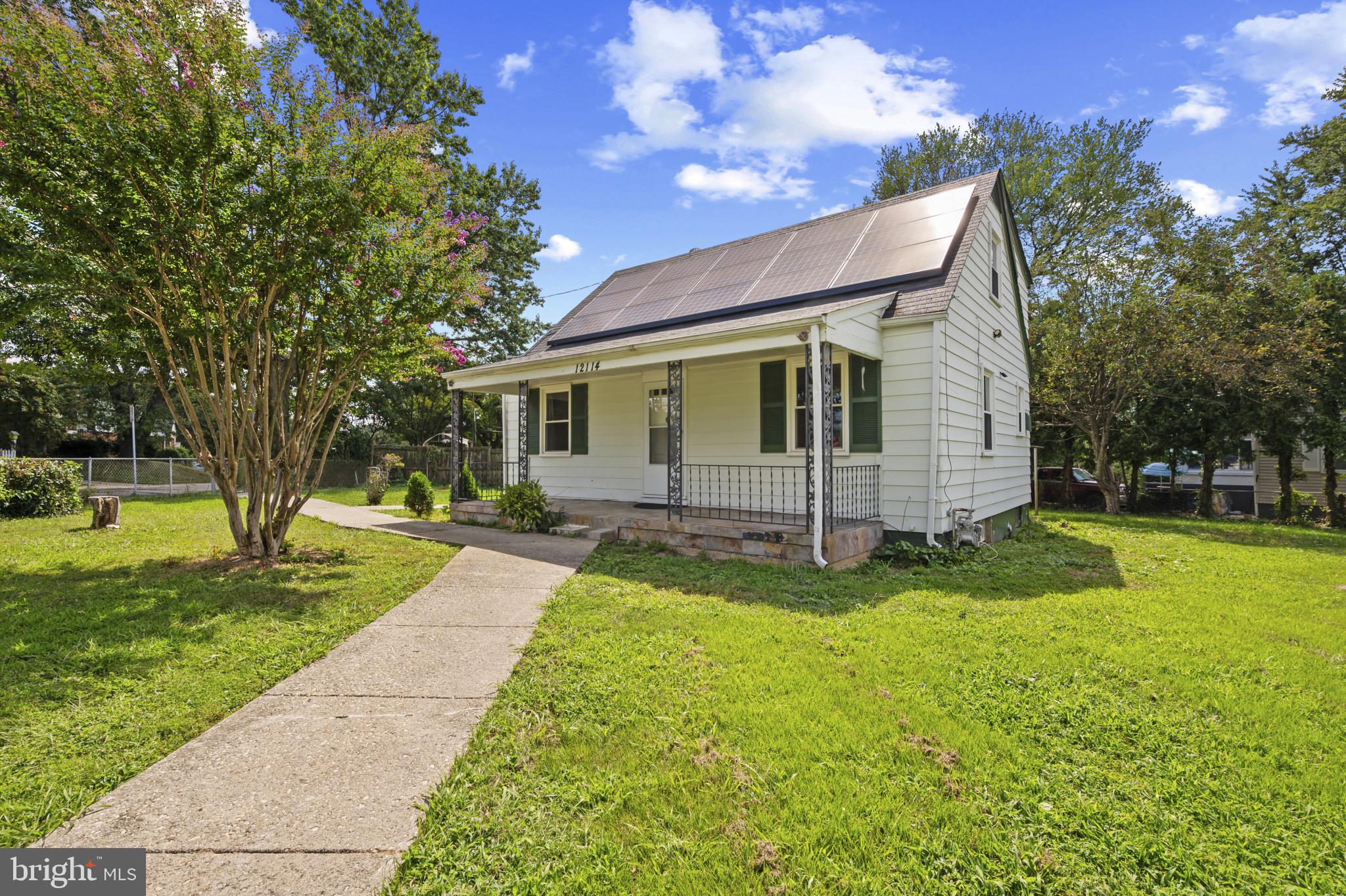 12114 Grandview Avenue Silver Spring, MD 20902 - Photo 1 of 24 a view of a backyard with a garden