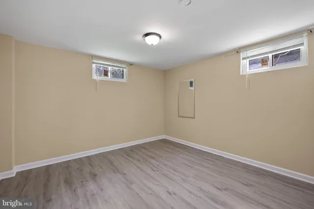 a kitchen with a stove and a sink