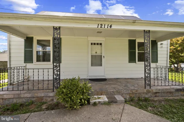 a view of a house with a small porch