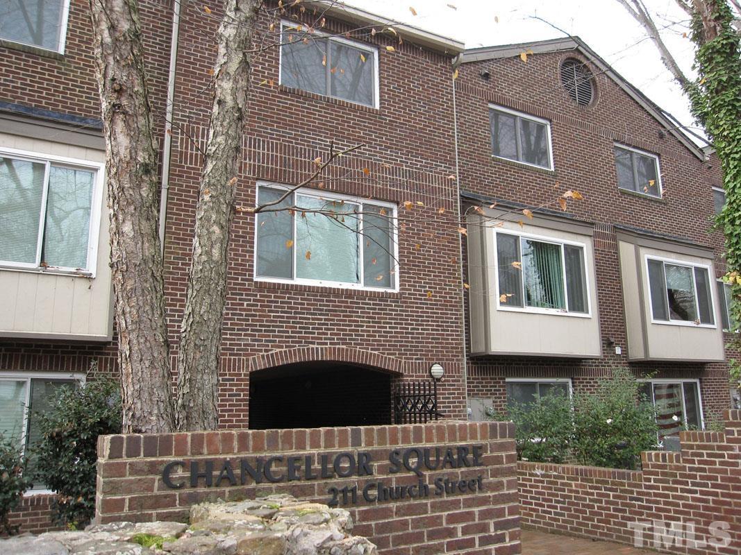 211 Church Street, Unit A8 Chapel Hill, NC 27516 - Photo 1 of 11 a front view of a house with yard
