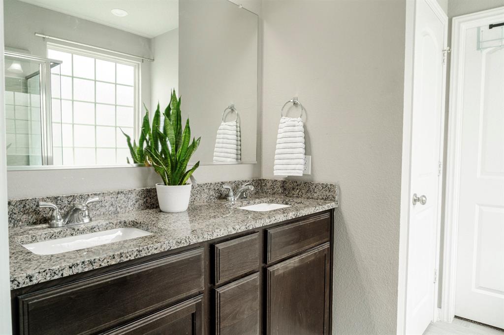 2716 Beutel Road Lorena, TX 76655 - Photo 17 of 39 a bathroom with sink and mirror