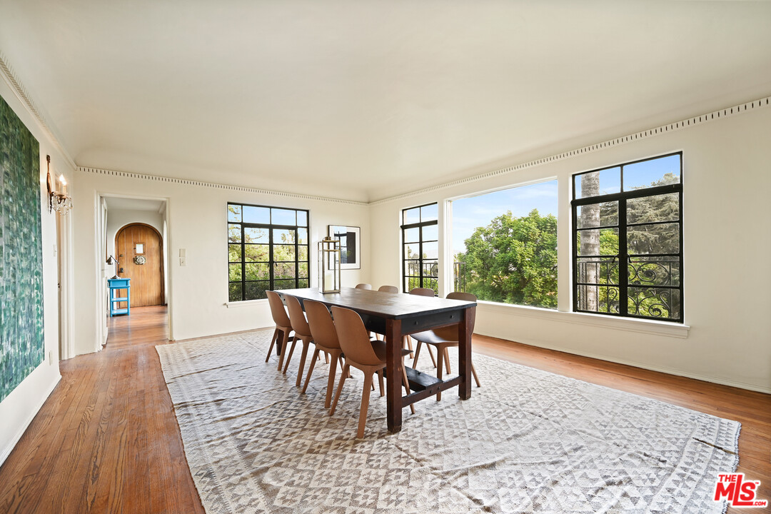 3551 Lowry Road Los Angeles, CA 90027 - Photo 13 of 50 a dining room with furniture window and wooden floor