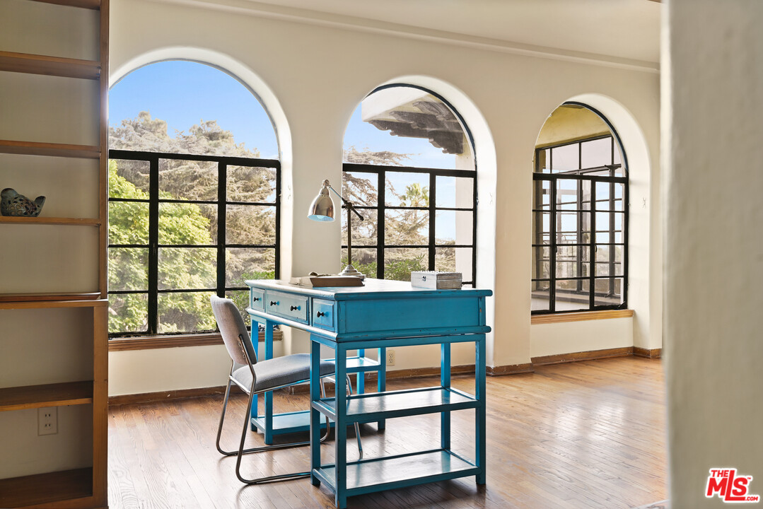 3551 Lowry Road Los Angeles, CA 90027 - Photo 15 of 50 a view of a dining room with furniture window and wooden floor