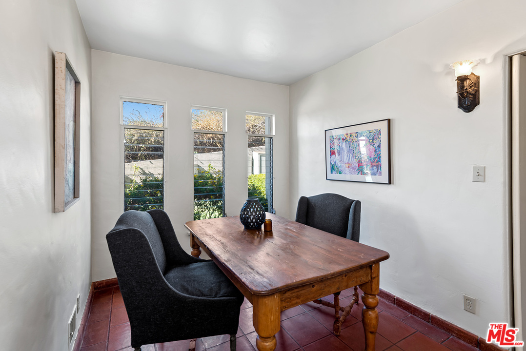 3551 Lowry Road Los Angeles, CA 90027 - Photo 23 of 50 a view of a dining room with furniture and wooden floor