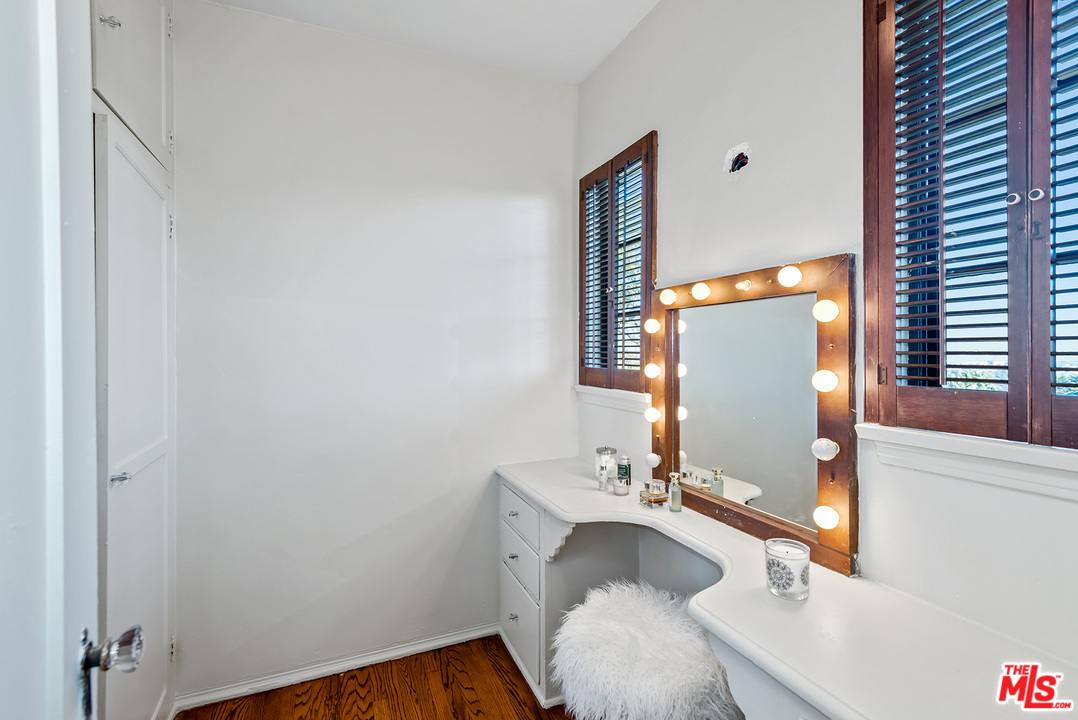 3551 Lowry Road Los Angeles, CA 90027 - Photo 32 of 50 a bathroom with a sink and a mirror