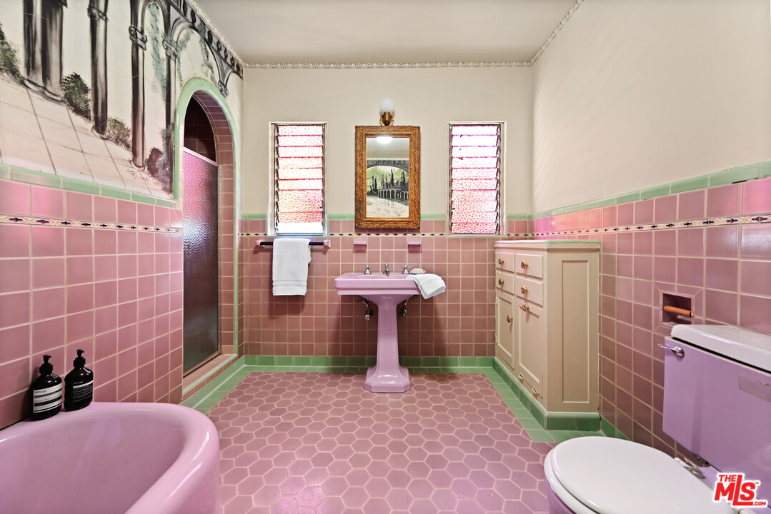 3551 Lowry Road Los Angeles, CA 90027 - Photo 34 of 50 a bathroom with a sink a toilet and shower