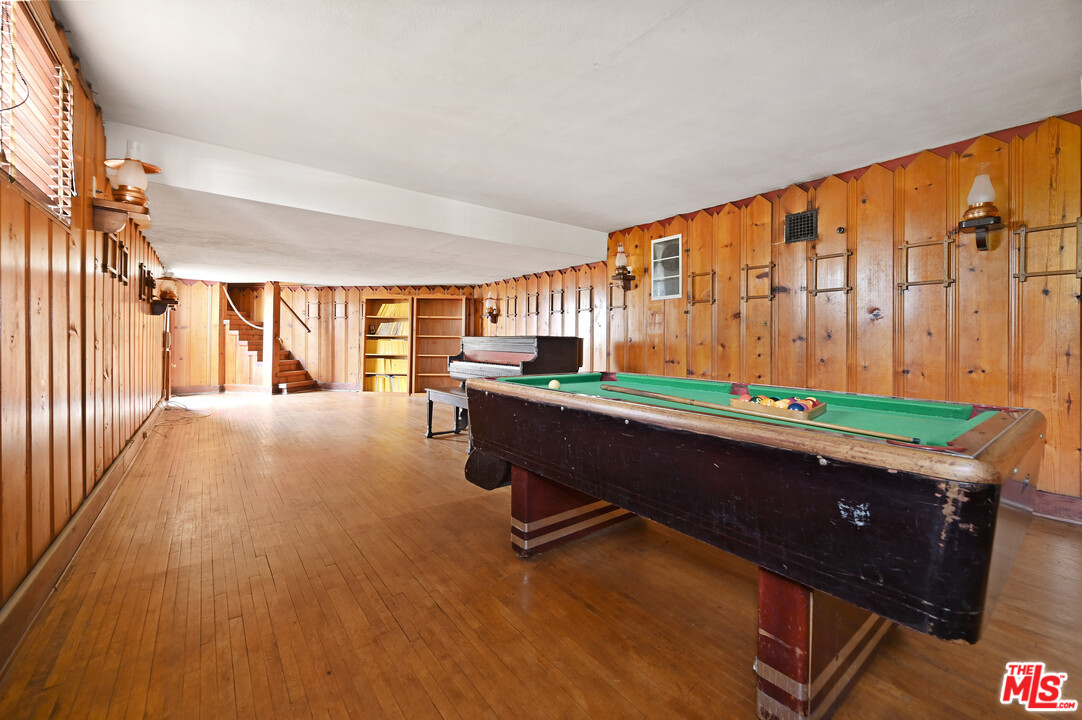 3551 Lowry Road Los Angeles, CA 90027 - Photo 47 of 50 a room with furniture pool table and windows