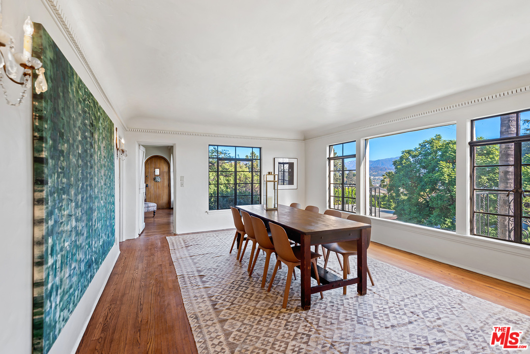 3551 Lowry Road Los Angeles, CA 90027 - Photo 10 of 50 a dining room with furniture and wooden floor
