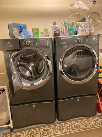 a utility room with dryer and washer