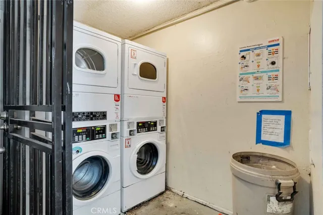 a bathroom with a toilet and a shower curtain