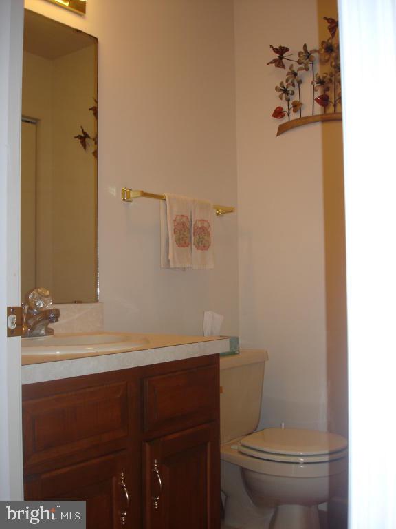 92 Sunrise Circle Denver, PA 17517 - Photo 6 of 15 a bathroom with a sink toilet and mirror