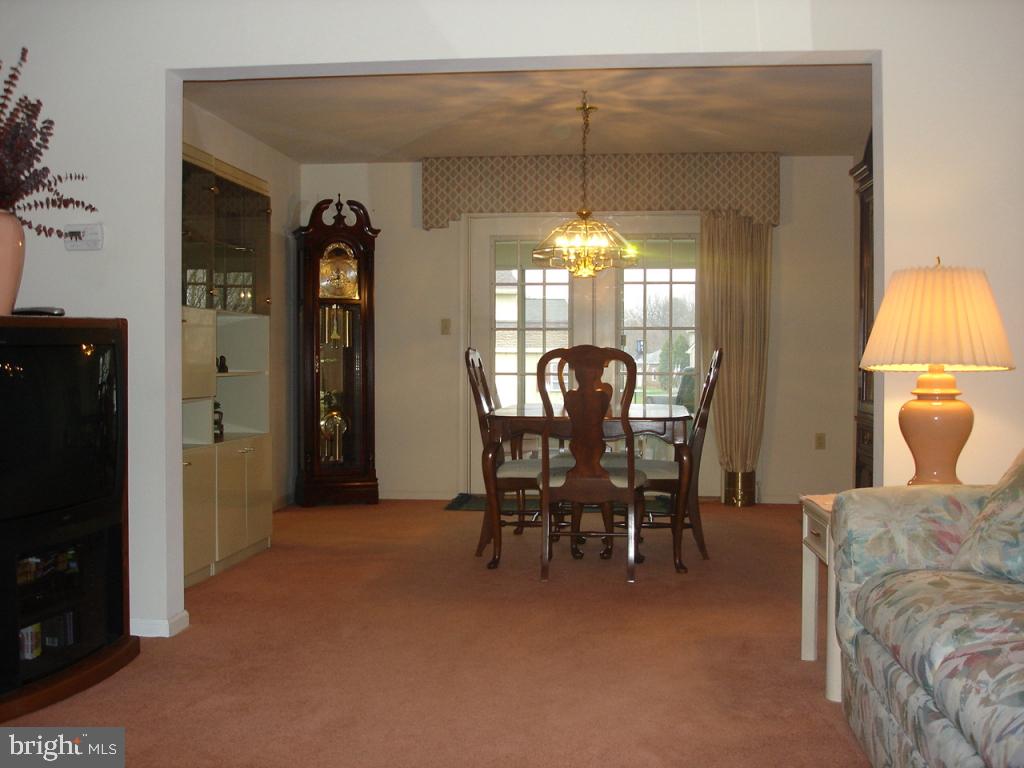 92 Sunrise Circle Denver, PA 17517 - Photo 8 of 15 a view of a livingroom with furniture and a dining table