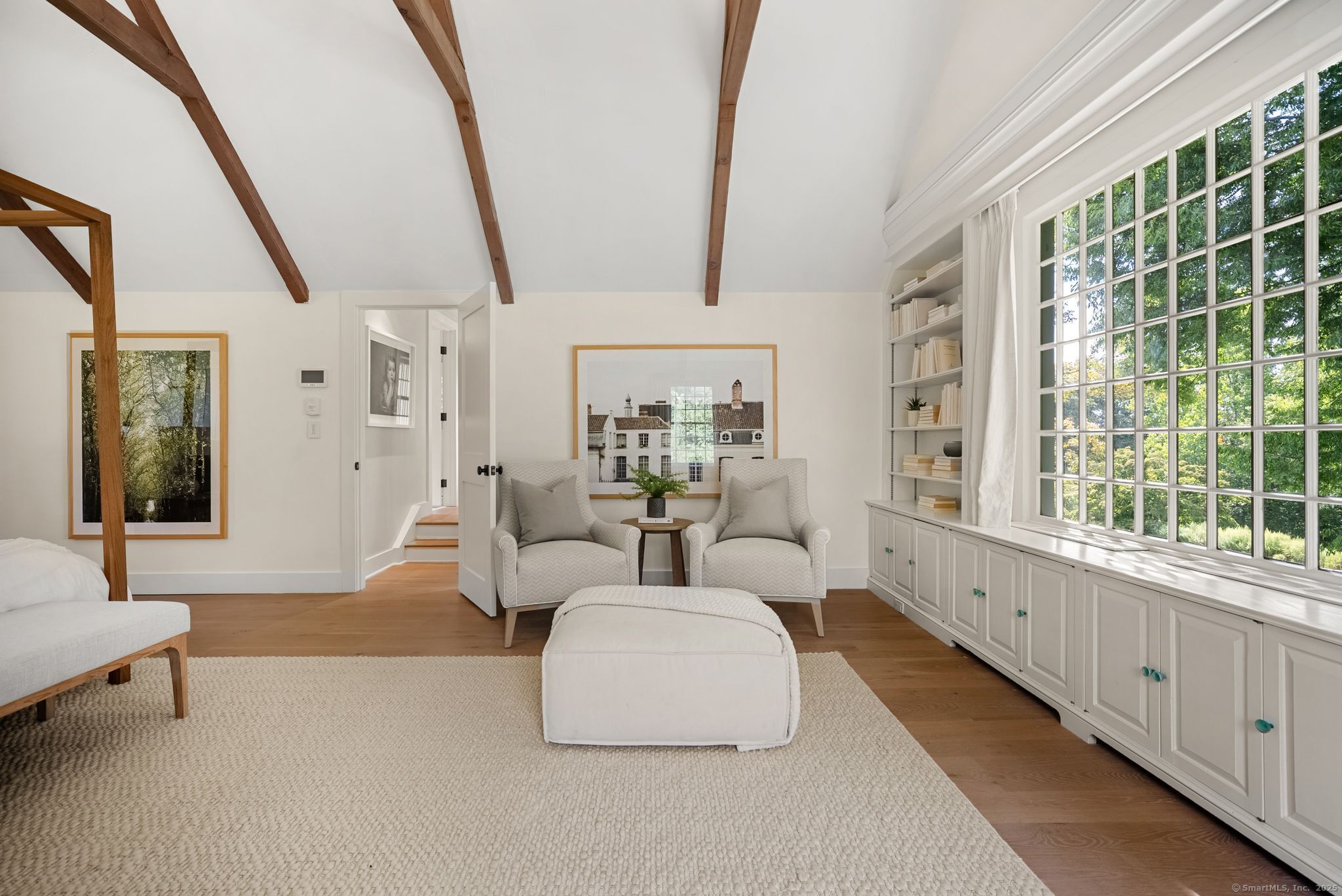 2281 Redding Road Fairfield, CT 06824 - Photo 19 of 40 a living room with furniture and a large window
