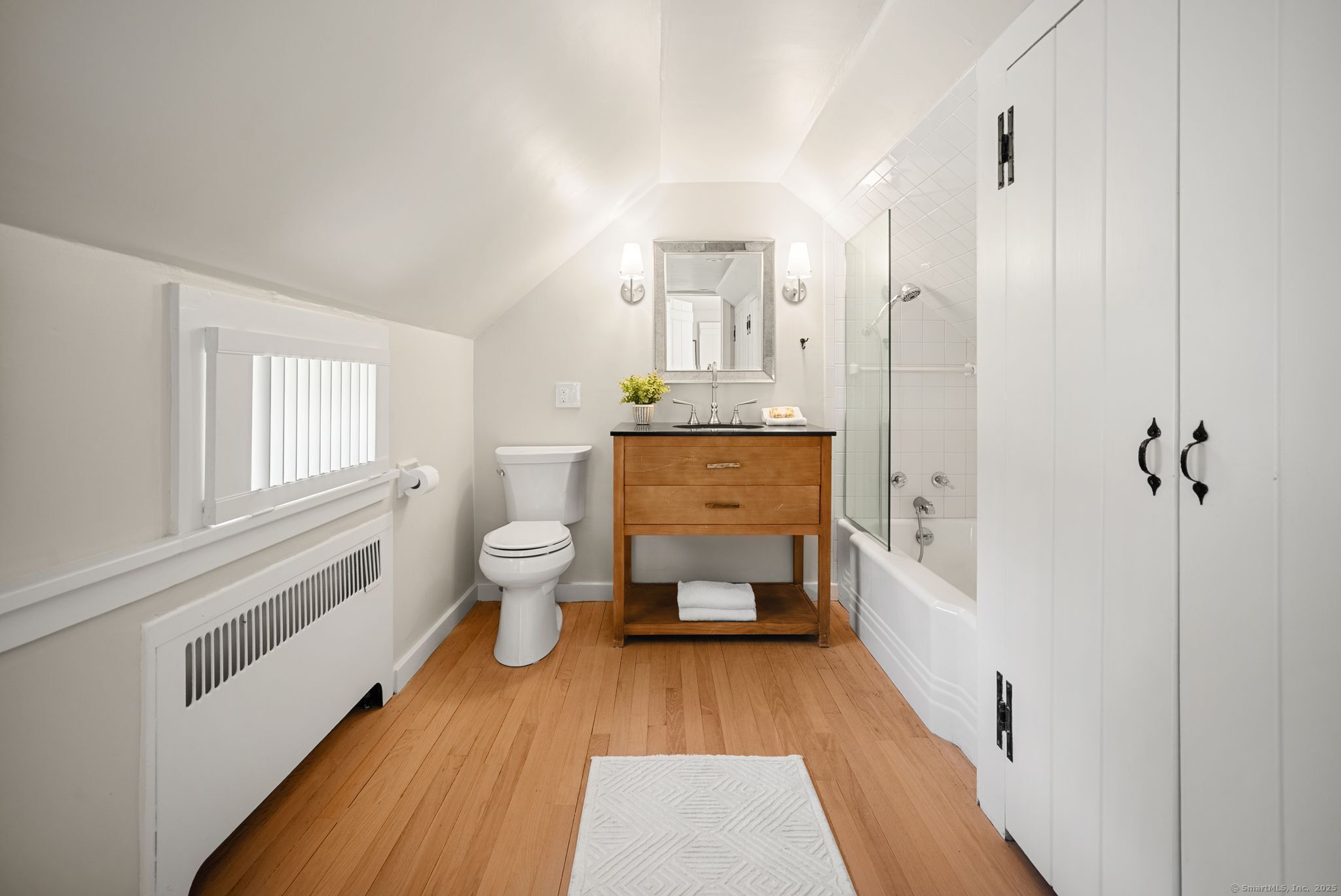 2281 Redding Road Fairfield, CT 06824 - Photo 23 of 40 a bathroom with a sink a toilet and shower