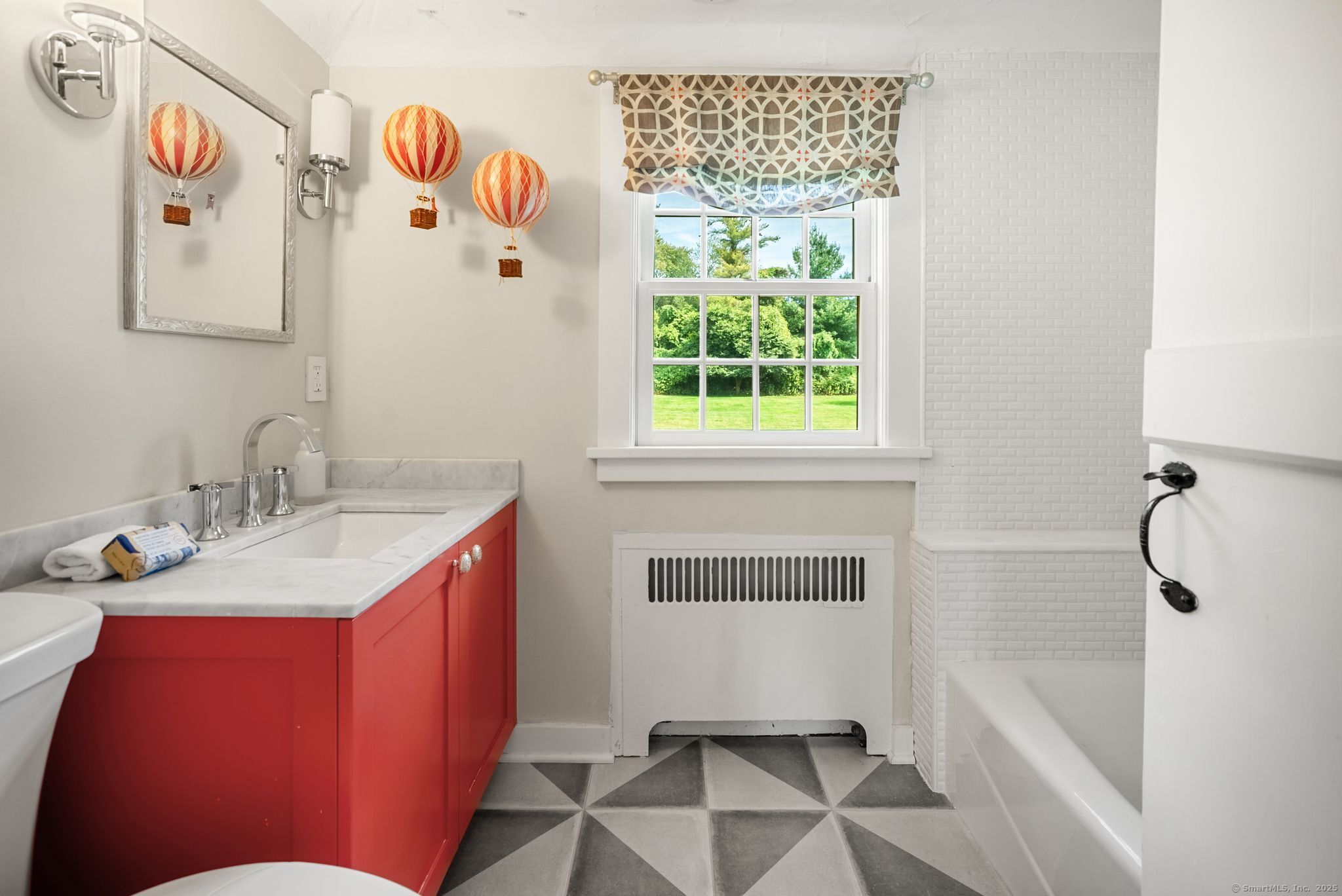 2281 Redding Road Fairfield, CT 06824 - Photo 25 of 40 a bathroom with a sink and a mirror