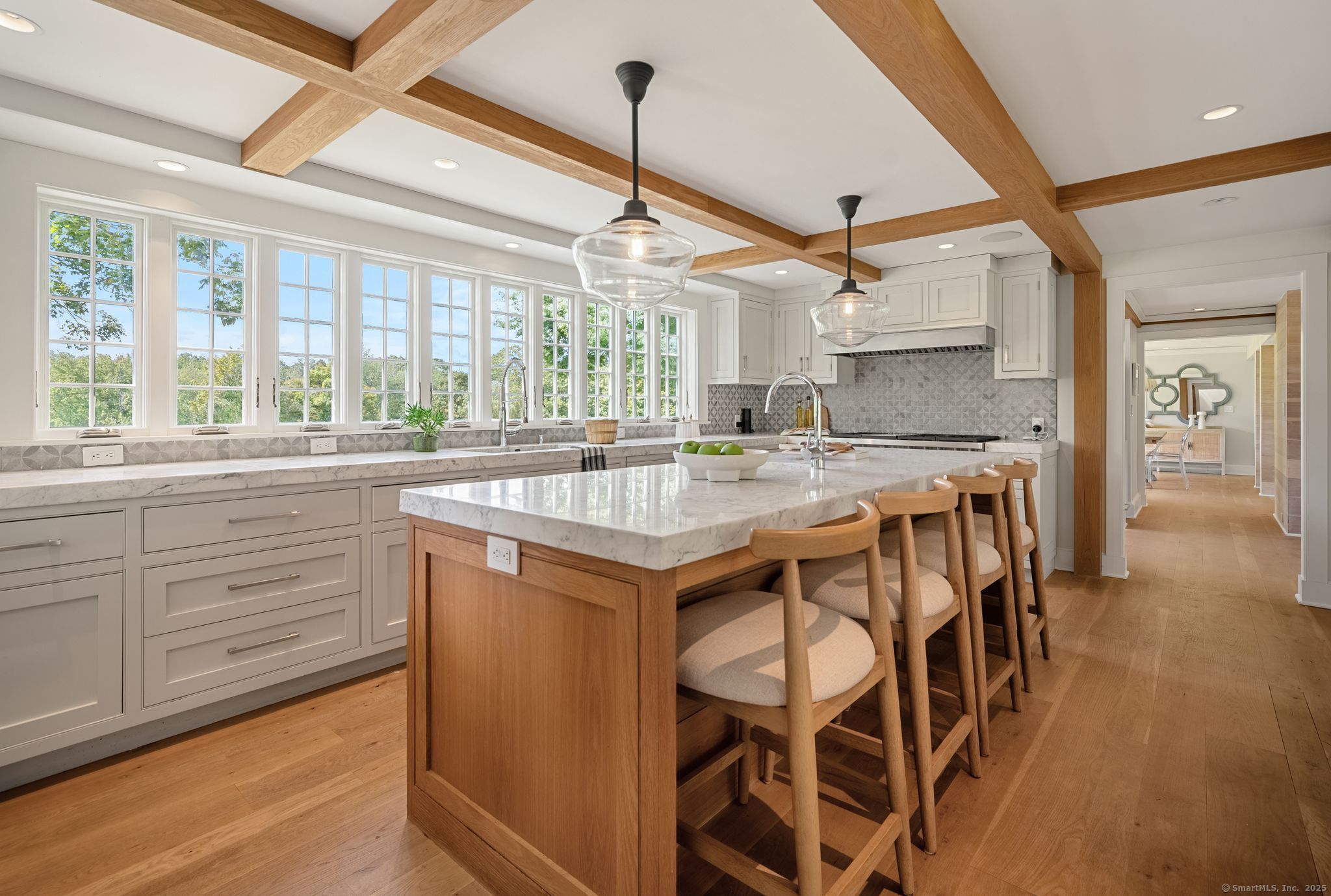 2281 Redding Road Fairfield, CT 06824 - Photo 6 of 40 a kitchen with a stove a sink and cabinets