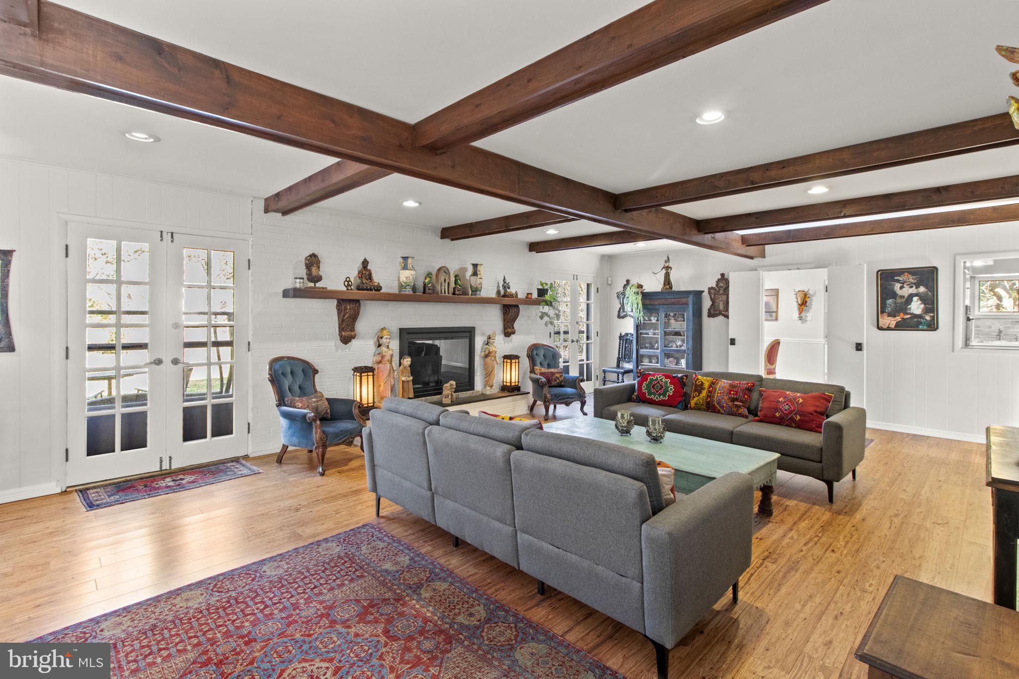 437 Crescent Road Wyncote, PA 19095 - Photo 15 of 53 Family room with two sets of French doors to patio