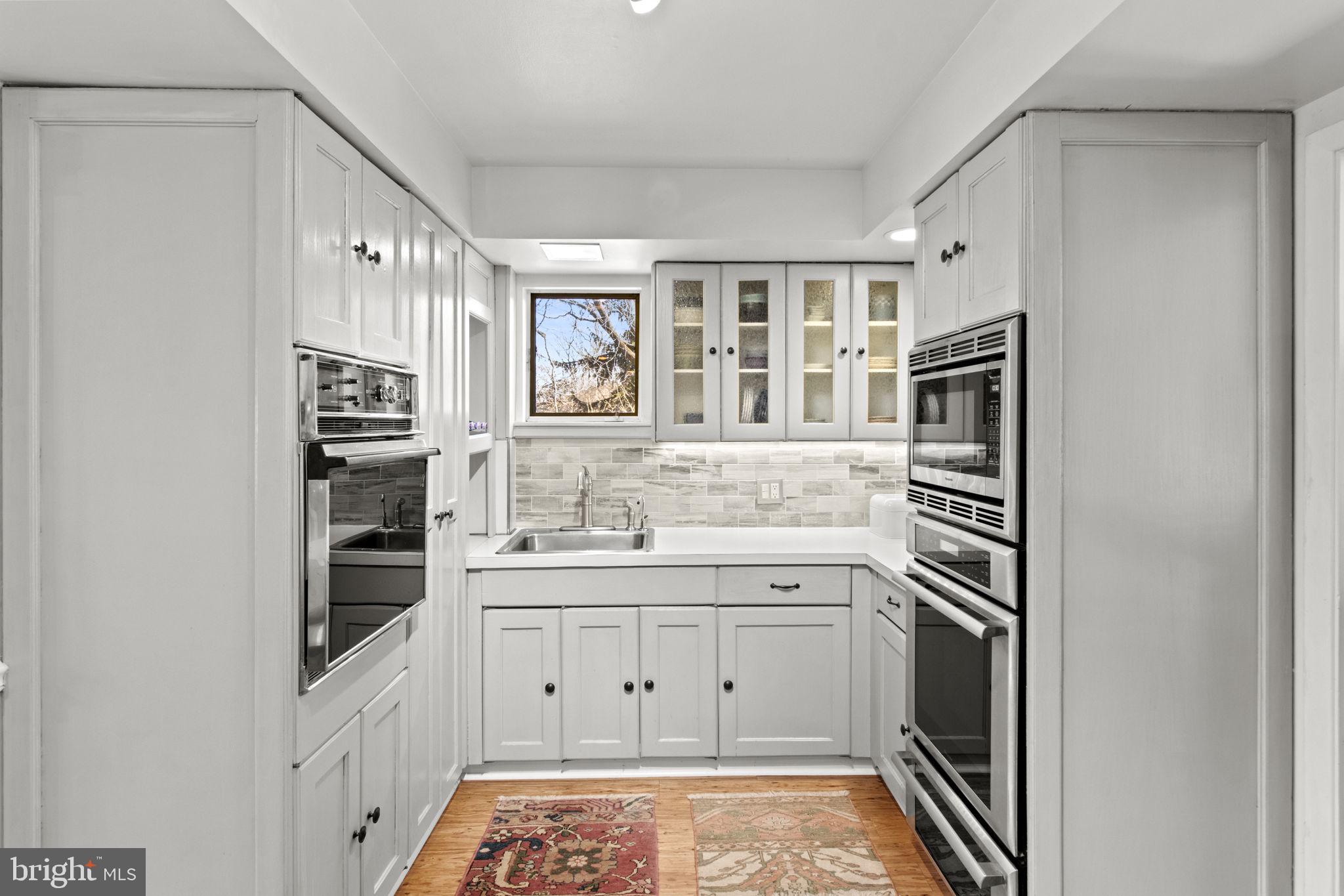 437 Crescent Road Wyncote, PA 19095 - Photo 10 of 53 Separate prep area w/ 2nd sink and two wall ovens