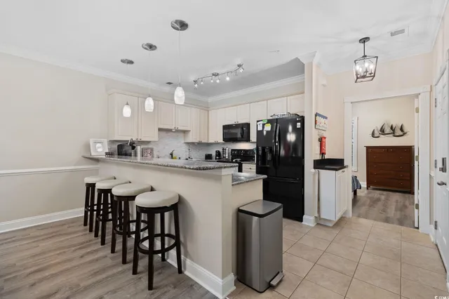 $325,000 | 4869 Luster Leaf Circle, Unit 104, Myrtle Beach, SC 29577