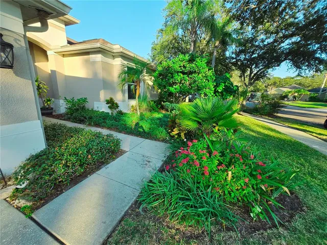a large bathroom with a sink a mirror and a toilet