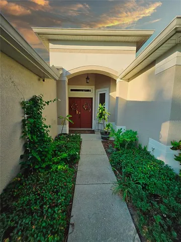 a bath room with a toilet and a bath tub