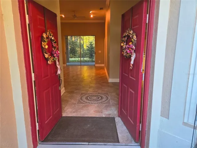 a bathroom with a toilet sink vanity and mirror