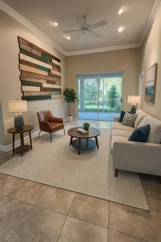 a living room with furniture and a large window