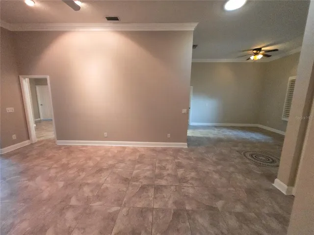 a view of backyard with green space