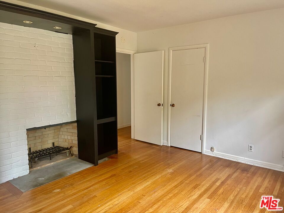 101 Larkin Place Santa Monica, CA 90402 - Photo 13 of 13 a view of empty room with wooden floor