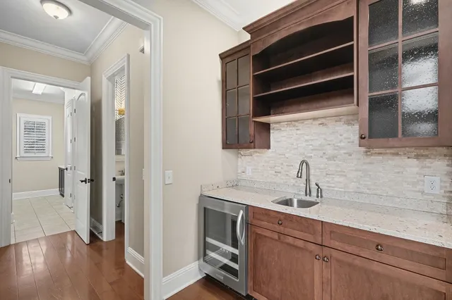 a kitchen with a sink and cabinets