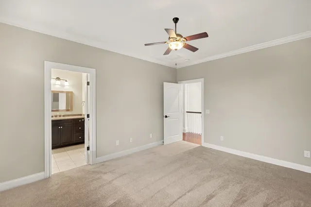 a view of an empty room with a bathroom